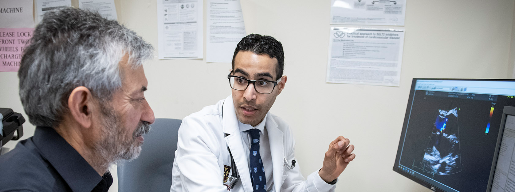 KHSC cardiologist Dr. Aws Almufleh (right) isn’t just educating patients about heart failure, but also other care providers in the community.