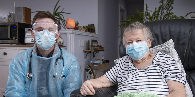 Nurse Mathew with Merrietta, who was a KHSC @ Home patient in 2021