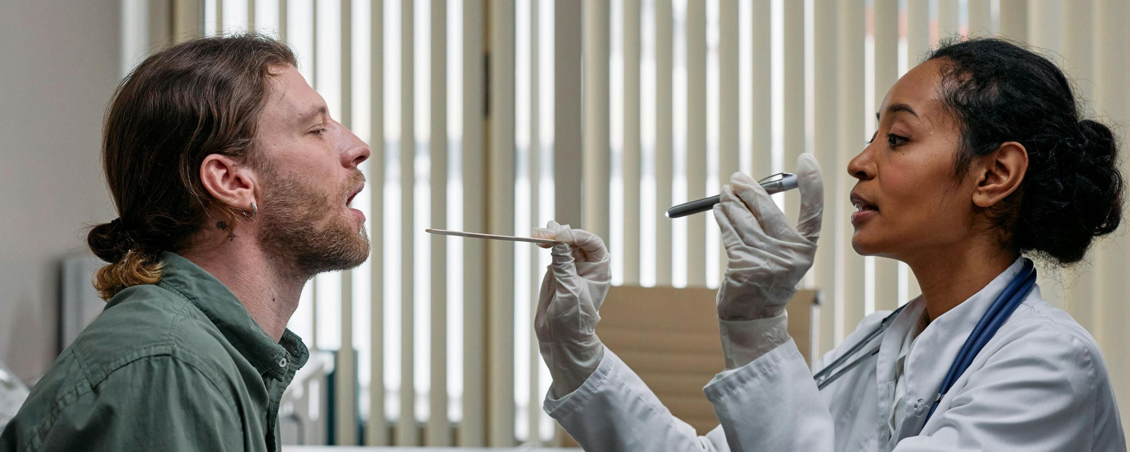 health care provider examining a patient